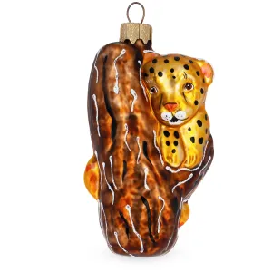 Leopard Climbing A Tree Branch Glass Christmas Ornament